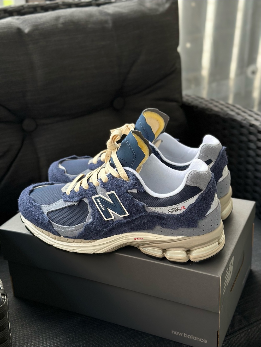 New Balance Men’s 2002R Protection Pack Navy and Cream Sneakers